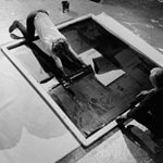 Andy and Gerard Malanga working at the Factory, NYC, March 1965