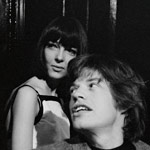 Baby Jane Holzer, model Peggy Moffitt and Mick Jagger at Holzer's apartment, NYC, winter 1964-65